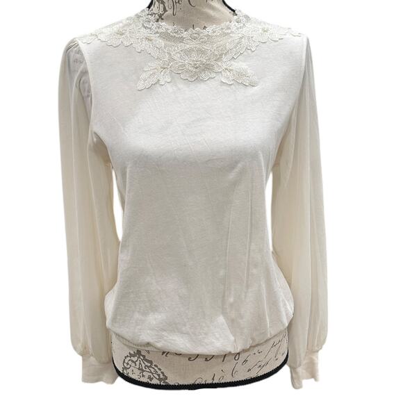 Anthropologie Tiny Long-Sleeve
Mock-Neck Lace Embellished Top - Picture 7 of 9